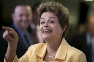 Brazil's President Dilma Rousseff gestures during news conference after event at the Planalto Palace in Brasilia
